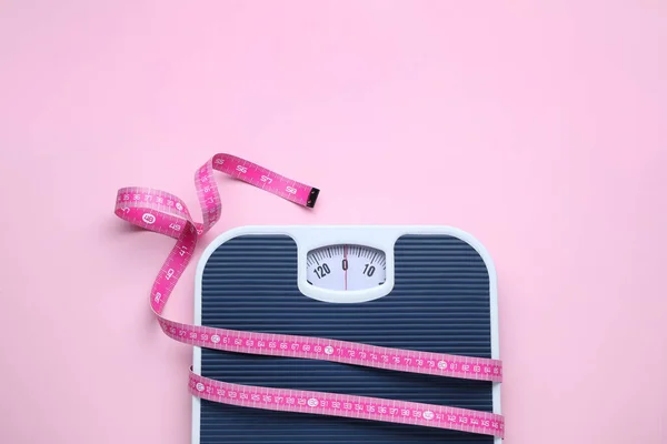 Scales Measuring Tape Pink Background Top View Space Text — Stock Photo, Image