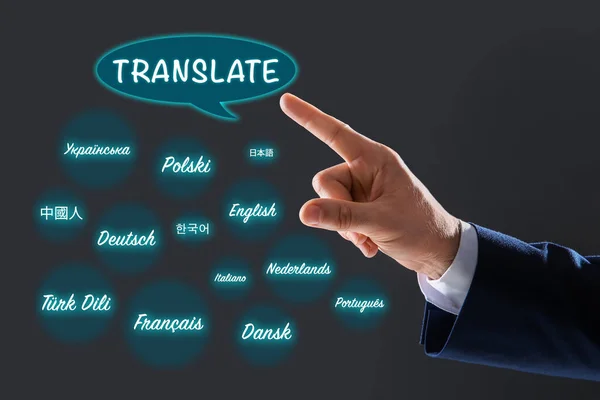 Translator Pointing Virtual Screen Names Different Languages Grey Background Closeup — Stock Photo, Image