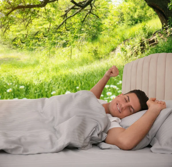 Happy Man Stretching Bed Beautiful View Park Background Sleep Well — Stock Photo, Image