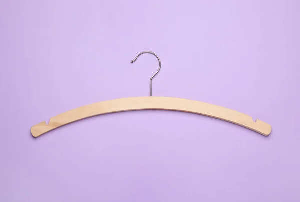 Empty Hanger Lilac Background Top View — Zdjęcie stockowe