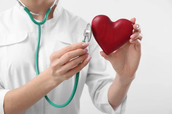Doctor Stethoscope Red Heart White Background Closeup Cardiology Concept — Fotografia de Stock