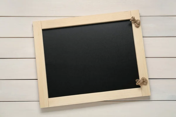 Clean Small Black Chalkboard White Wooden Table Top View — Stock Photo, Image