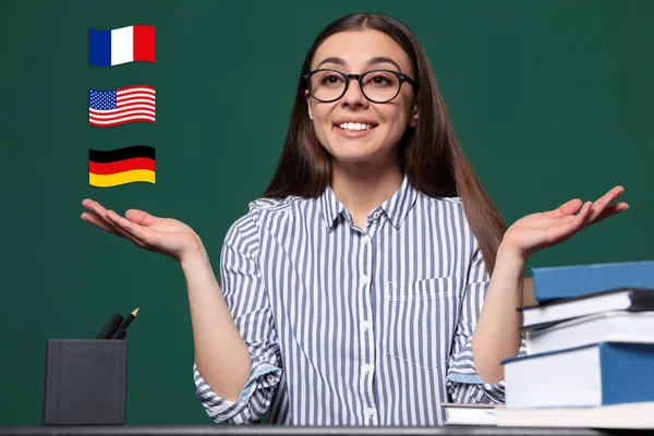 Portrait Foreign Languages Teacher Table Different Flags Green Chalkboard — Stock Photo, Image