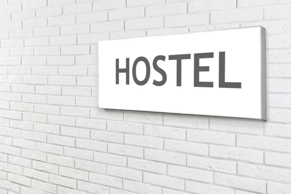 Hostel Sign Board White Brick Wall — Stock Photo, Image