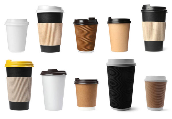 Set with paper coffee cups with lids on white background