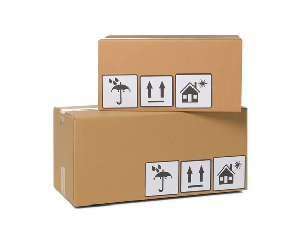 Duas Caixas Papelão Fechadas Com Símbolos Embalagem Isolados Branco Serviço — Fotografia de Stock