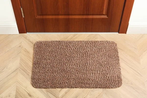 New clean rectangle mat near entrance door