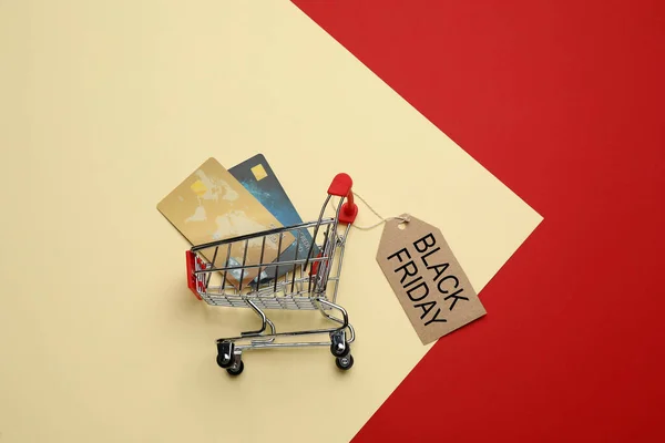 Shopping Cart Credit Cards Tag Phrase Black Friday Color Background — Stockfoto