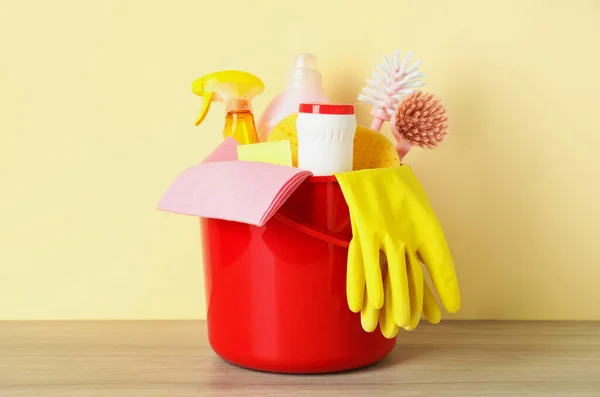 Bucket Different Cleaning Supplies Wooden Floor Beige Wall — Stock Photo, Image