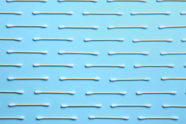 Many Cotton Buds Light Blue Background Flat Lay — Stock Photo, Image