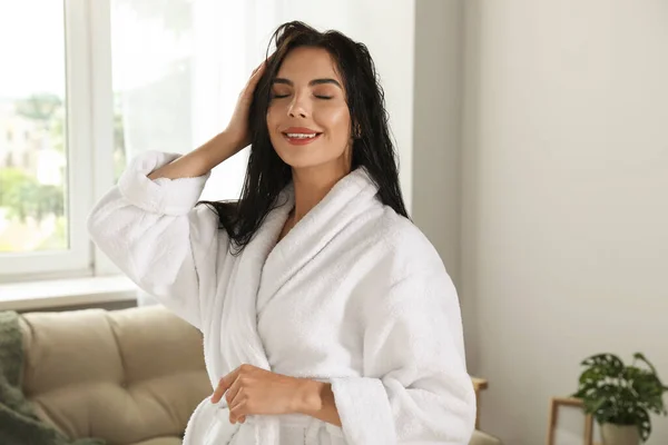 Beautiful Young Woman Wearing White Bathrobe Indoors — Stock Photo, Image