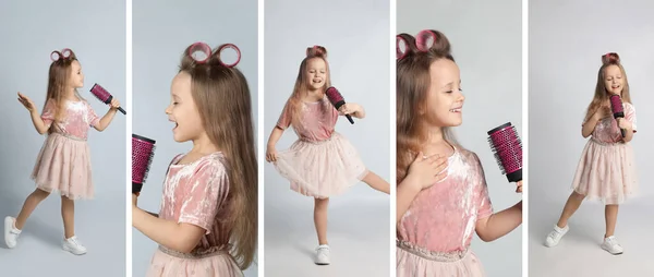 Açık Gri Arka Planda Şarkı Söyleyen Komik Küçük Kızın Fotoğraflarıyla — Stok fotoğraf