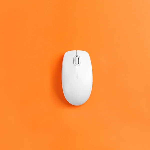 Modern Wireless Computer Mouse Orange Background Top View — 스톡 사진
