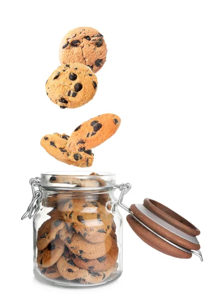 Tasty Chocolate Chip Cookies Falling Glass Jar White Background — Foto Stock