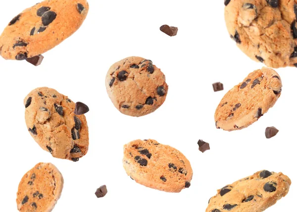 Delicious Chocolate Chip Cookies Falling White Background — Stockfoto