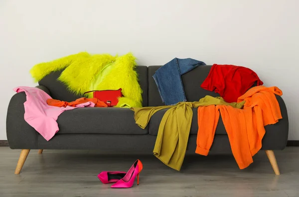 Messy Pile Colorful Clothes Sofa Shoes Living Room — Fotografia de Stock