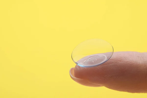 Woman Contact Lens Yellow Background Closeup Space Text — Stockfoto