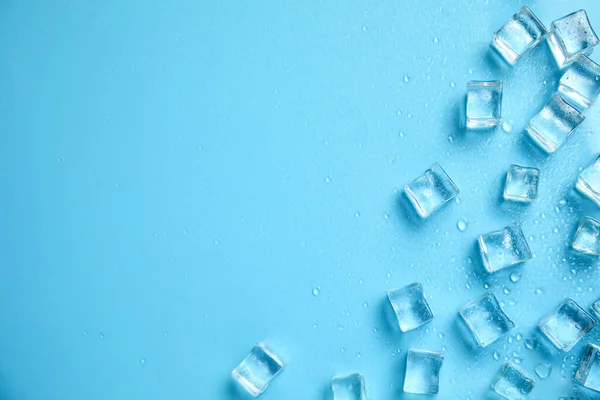 Ice Cubes Water Drops Space Text Turquoise Background Flat Lay — Foto Stock