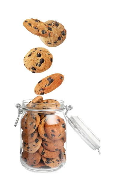 Tasty Chocolate Chip Cookies Falling Glass Jar White Background — Foto Stock