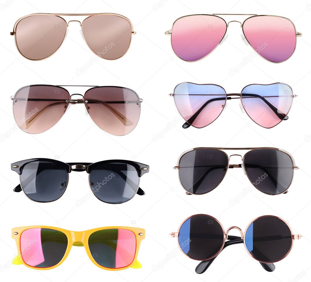 Set with different stylish sunglasses on white background