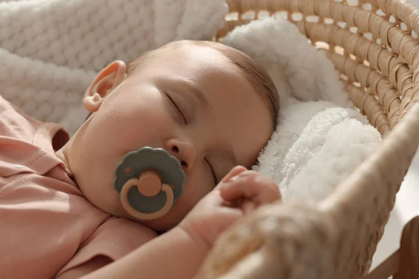 Cute Little Baby Pacifier Sleeping Wicker Crib Closeup — Fotografia de Stock