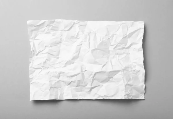 Sheet White Crumpled Paper Grey Background Top View — Stock Photo, Image