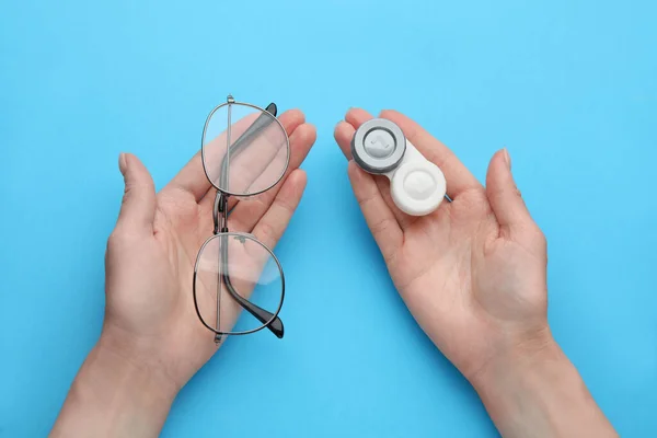 Woman Holding Case Contact Lenses Glasses Light Blue Background Top — Stok fotoğraf