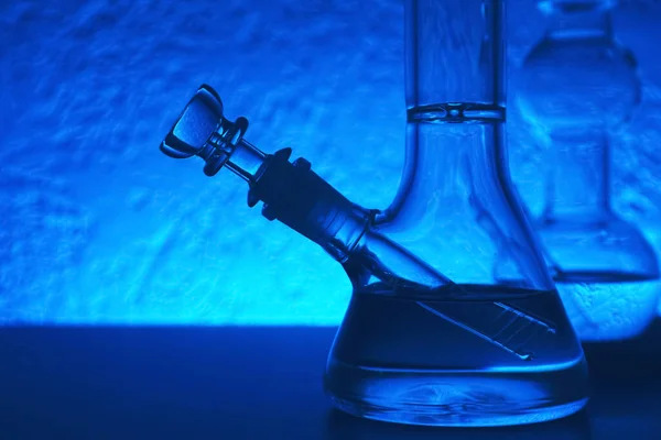 Closeup View Glass Bongs Table Toned Blue Smoking Device — Stockfoto