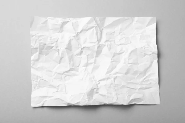 Sheet White Crumpled Paper Grey Background Top View — Stock Photo, Image