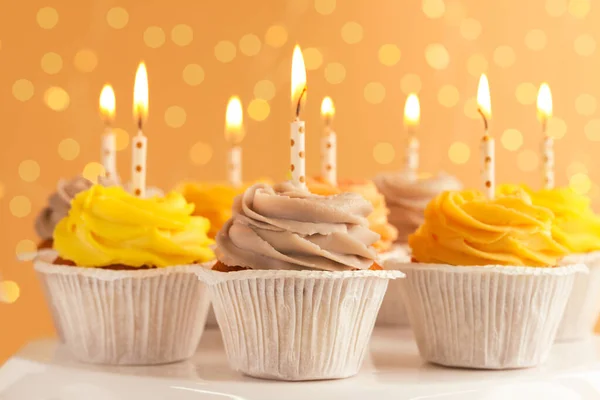 Tasty Birthday Cupcakes White Stand Blurred Lights Closeup — Stockfoto