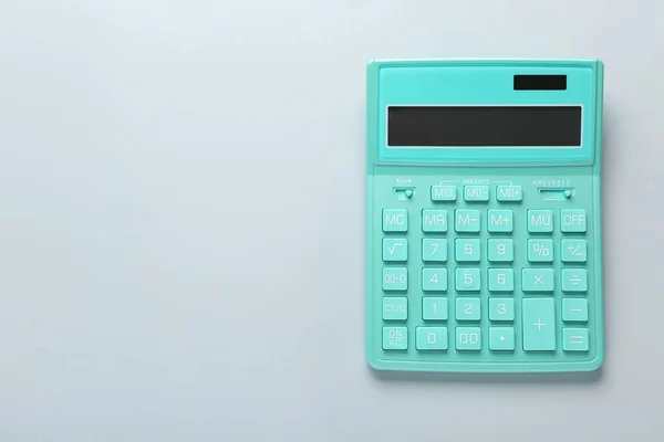 Turquoise Calculator Light Background Top View Space Text — Stockfoto