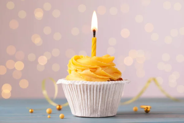 Tasty Birthday Cupcake Light Blue Wooden Table Blurred Lights — Stockfoto