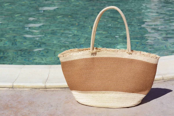 Stylish Bag Outdoor Swimming Pool Sunny Day Space Text Beach - Stock-foto