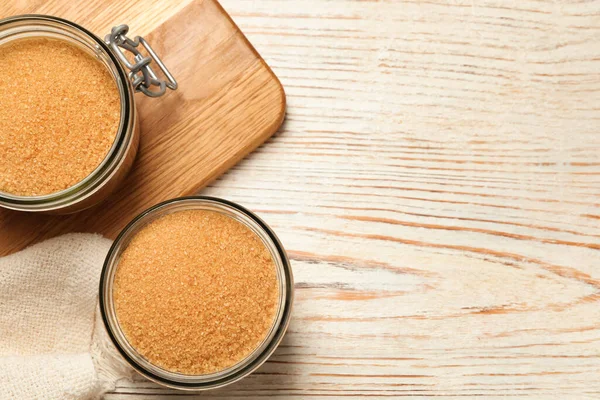 Glass Jars Brown Sugar White Wooden Table Flat Lay Space — Fotografie, imagine de stoc