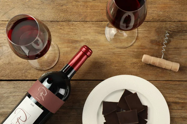 Flat Lay Composition Tasty Red Wine Chocolate Wooden Table — 图库照片