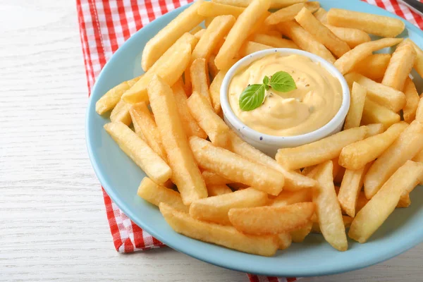 Delicious French Fries Cheese Sauce Basil White Wooden Table Closeup — Photo