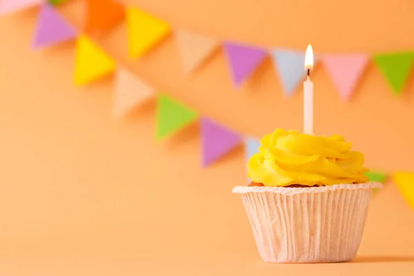 Tasty Birthday Cupcake Candle Orange Table Party Flags Space Text —  Fotos de Stock