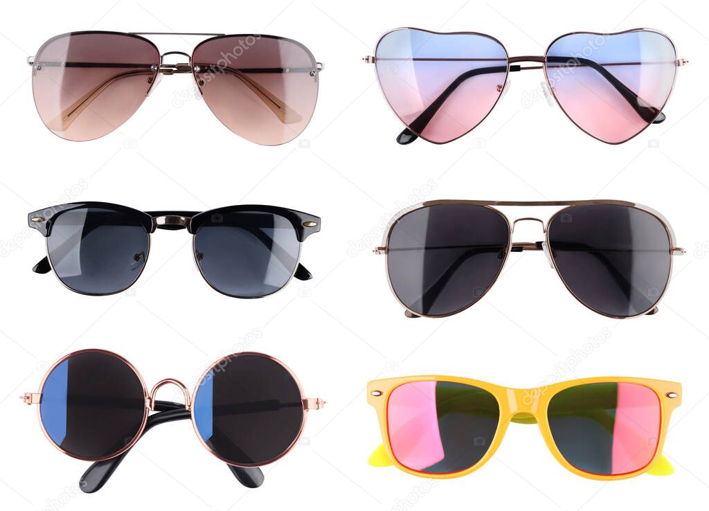 Set with different stylish sunglasses on white background