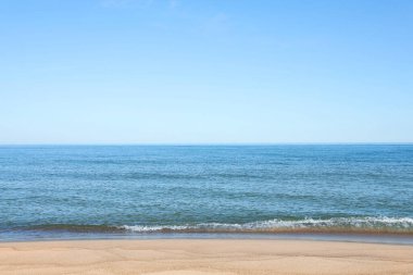 Picturesque view of sandy beach near sea