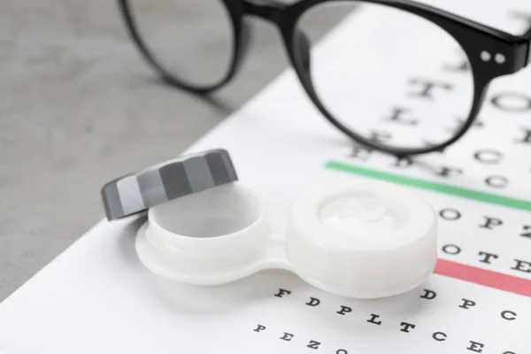 Case Contact Lenses Eye Chart Test Glasses Table Closeup — Foto Stock