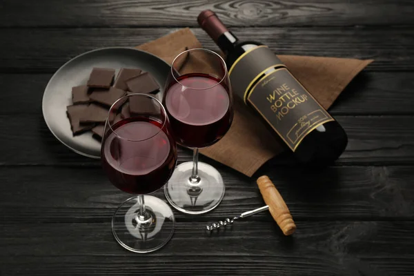 Composition Tasty Red Wine Chocolate Black Wooden Table — 图库照片