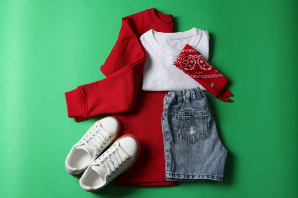 Stylish Child Clothes Shoes Green Background Flat Lay — 스톡 사진