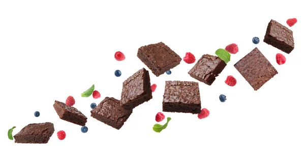 Slices Delicious Chocolate Brownie Fresh Berries Mint Flying White Background — Stockfoto