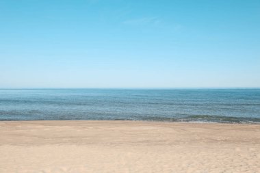 Picturesque view of sandy beach near sea