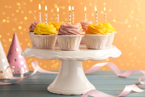 White Stand Tasty Birthday Cupcakes Light Blue Wooden Table Blurred — Stok fotoğraf