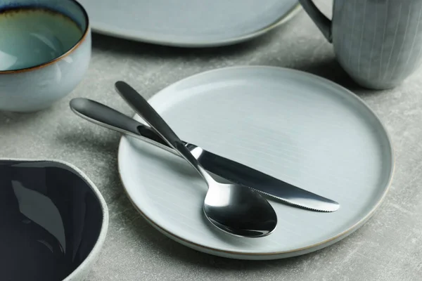 Stylish Empty Dishware Cutlery Light Grey Table Closeup — 图库照片