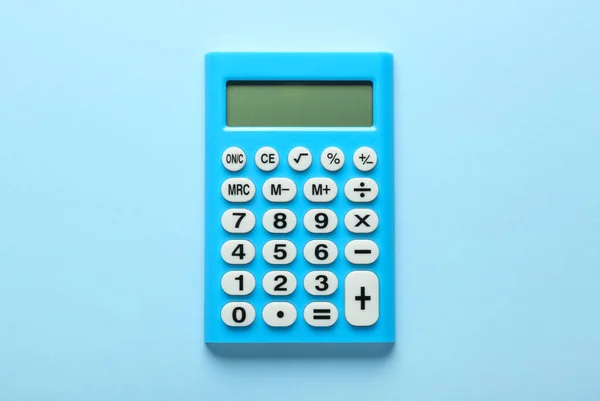 Light Blue Calculator Turquoise Background Top View — Fotografia de Stock