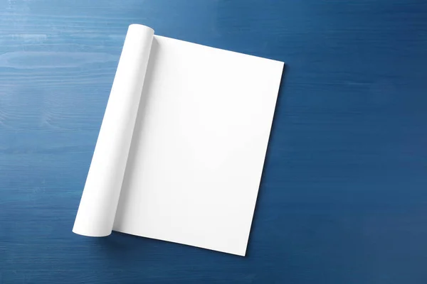 Open Magazine Blank Page Blue Wooden Table Top View Space — Stockfoto