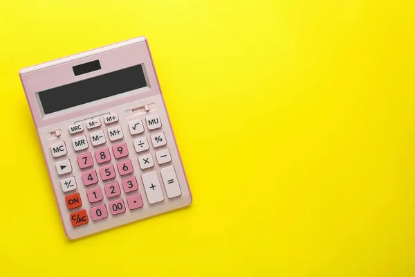 Pink Calculator Yellow Background Top View Space Text — Stok fotoğraf