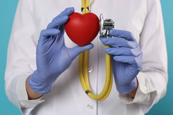 Doctor Stethoscope Red Heart Light Blue Background Closeup Cardiology Concept — Fotografia de Stock